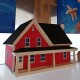 Maison rouge, typique des Îles-de-la-Madeleine.